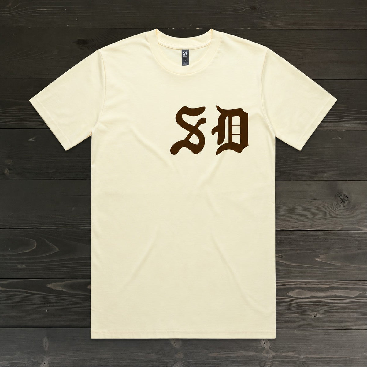 Men Brown Old English SD on Creme Tee | TM-032